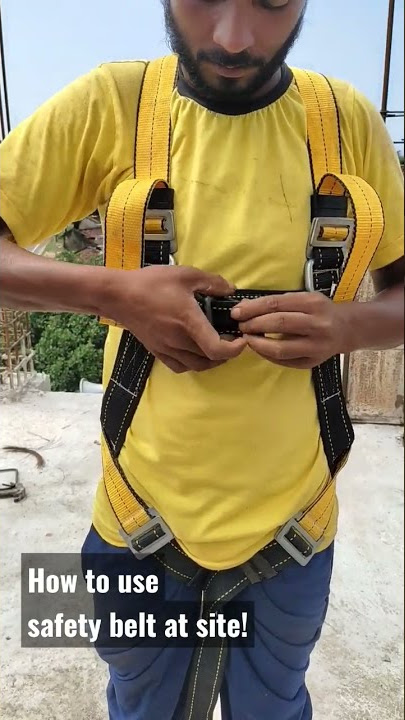 How to wear a safety belt at a construction site.