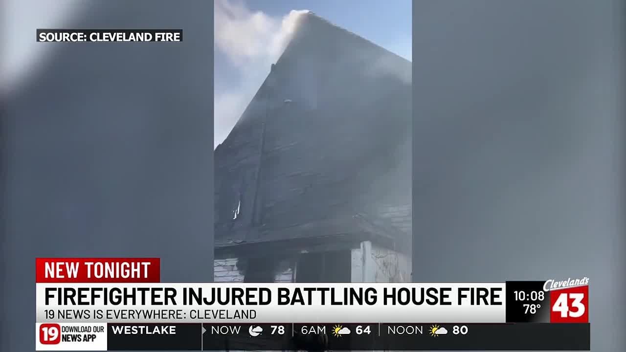 Cleveland firefighter taken to hospital after house fire
