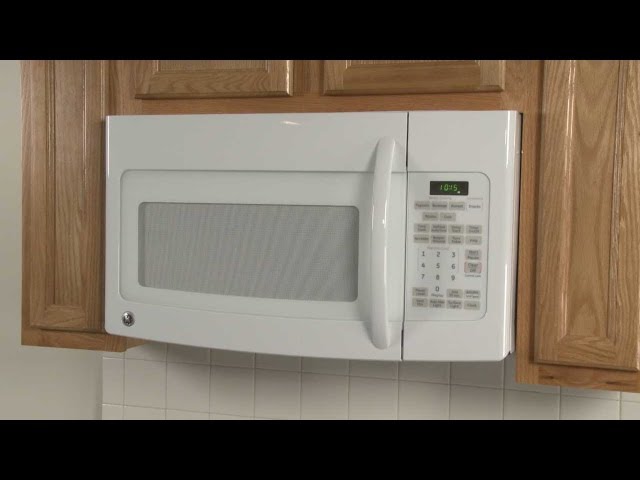 Where is the fuse located in a GE Microwave Oven?