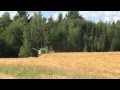 JD model 42 combine pulled by 1952 Farmall Super M