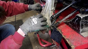 HOW TO REPLACE A FRONT CV AXLE ON A POLARIS SPORTSMAN.