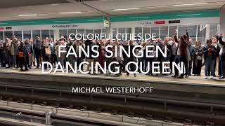 Fans sing Abba‘s Dancing Queen on the platform of Pudding Mill Station in London