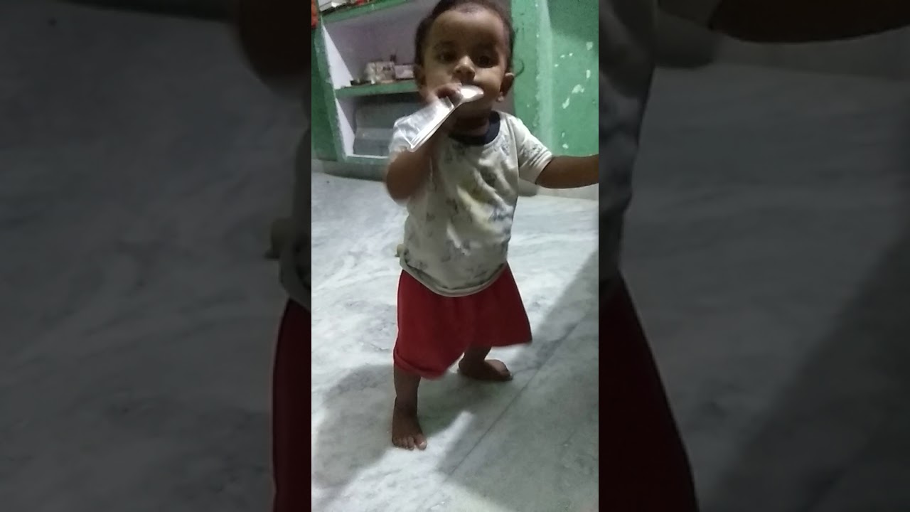 My 9 month old niece dancing on bhajan - YouTube