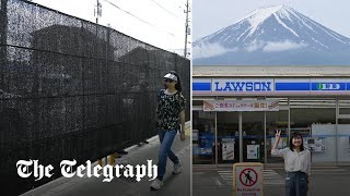 video: Watch: Japanese town blocks view of Mount Fuji to deter tourists