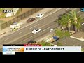 Police pursue possible armed suspect through West LA and San Fernando Valley