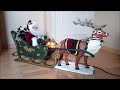 Holiday creations santa brown sleigh  and reindeer rudolph  pre nol en traneau marron avec renne