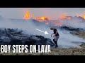 Boy steps on the lava and burns his hand while cooking something on lava. Iceland Volcano 10.07.23