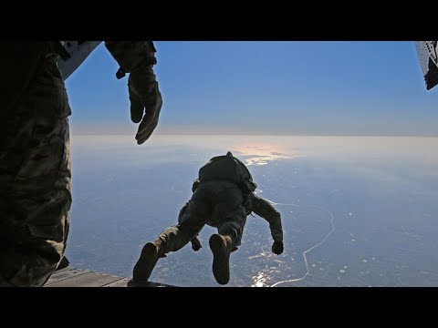 U.S  Army and Latvian Special Forces Conduct HALO Jump