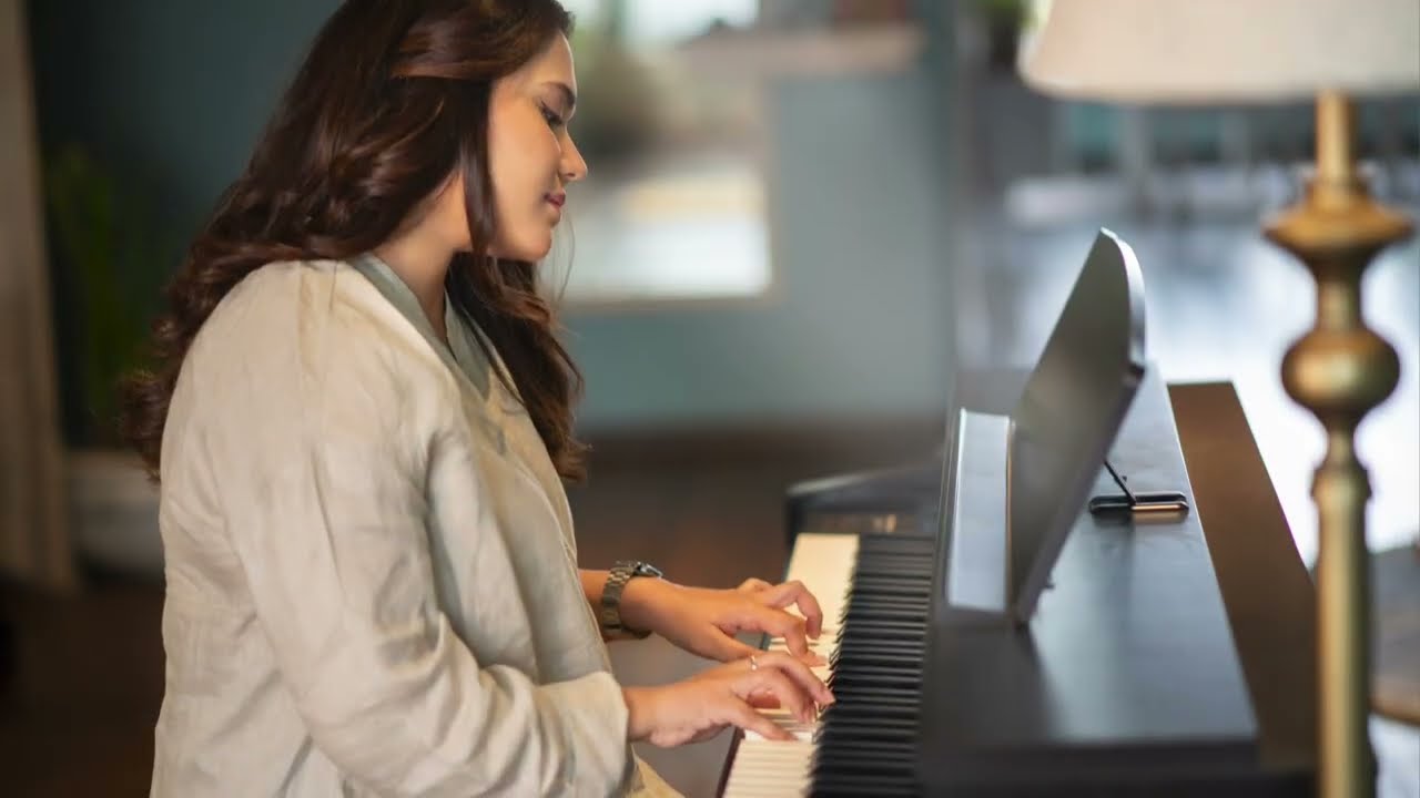 Priya Saraiya at the piano in her cover of Phir Aur Kya Chahiye