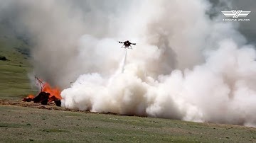 Forest fire fighting with firefighting drone