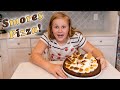 Assistant bakes a Smores Pizza in her kitchen