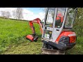 Thick bramble clearance with excavator and flail attachment