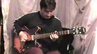 Adis - in the style of Eric Johnson - blues guitar player