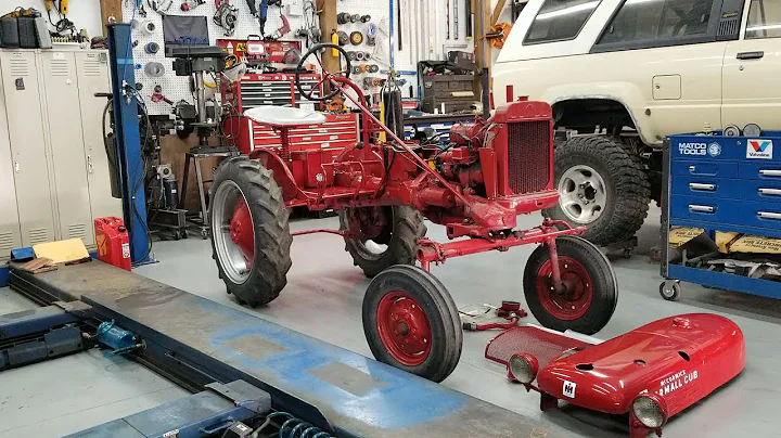 After years of sitting, I get the tractor started that my grandfather bought new in 1952