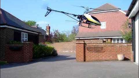 T-Rex 450 SEv2 first flight in 2009 just saying hello