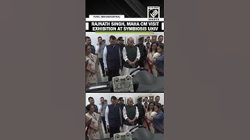Defence Min Rajnath Singh accompanied by Maha CM Fadnavis visit exhibition at Symbiosis University