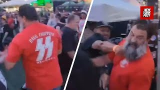 ‘No f**king Nazis!’: Punk-rockers rough up fan wearing SS shirt