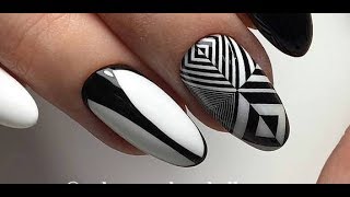видео Эффектный черно-белый маникюр на короткие ногти: фото-подборка