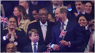 William hilariously messes around with Charlotte and George by waving flags in their faces