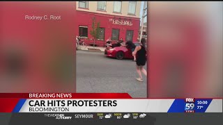 Protesters struck by car in Bloomington