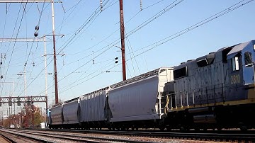 CSX GP38-2 No 2810 with Conrail Caboose on NEC Line Jersey Avenue Station