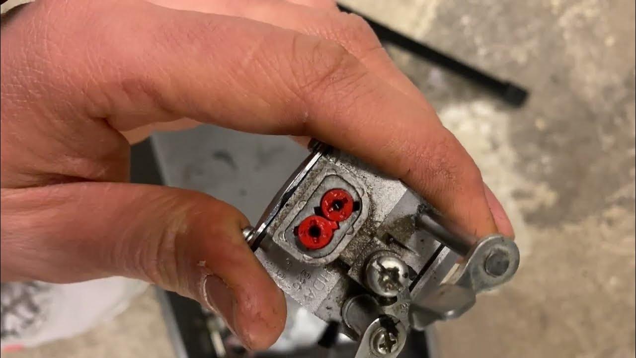 How to remove the adjustment screws plastic covers on a HDA Walbro