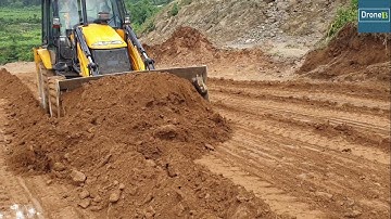 Undercutting Hill and Mud for the Hilly Football Ground-Backhoe Loader