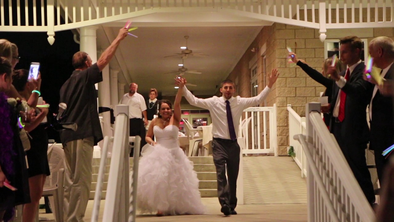 Epic Wedding Send Off with Glow Sticks Thrown at Bride and Groom 