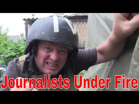 Journalists Come Under Ukraine Artillery Fire In Donetsk Suburb