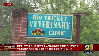 Deputy & suspect exchange fire outside vet clinic prior to manhunt