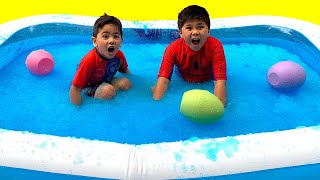 Troy and Izaak with Gelli Baff and Surprise Eggs in the Swimming Pool TBTFUNTV