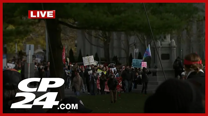 Protesters march against Bill 60 in downtown Toronto