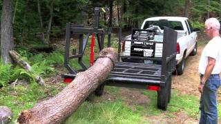 Firewood Log Trailer log trailer with load/unload capability.