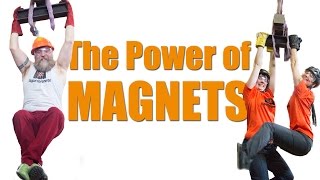 Huge super magnet lifting two people - The Power of Magnets - supermagnete