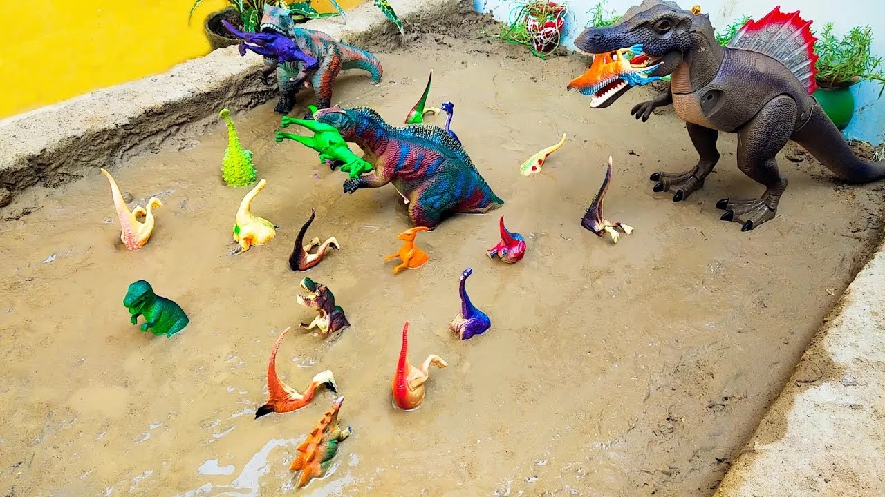 Plastic Toy Dinosaurs Stuck in the Sandbox Dinosaur Toys Collection