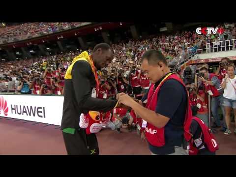 Usain Bolt Receives Gift from Cameraman Who Crashed into Him