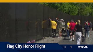 Local veterans take in Vietnam Veterans Memorial on Flag City Honor Flight