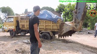 Dump Truck Stuck Recovery By Volvo EC210B Excavator