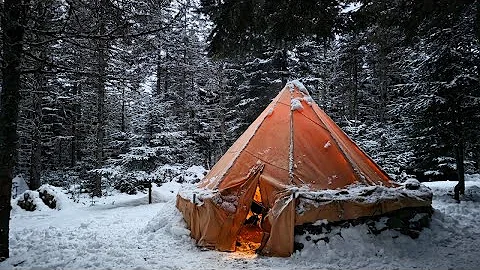 Winter Camping in our Bushcraft Shelter in a Snow Covered Wilderness.