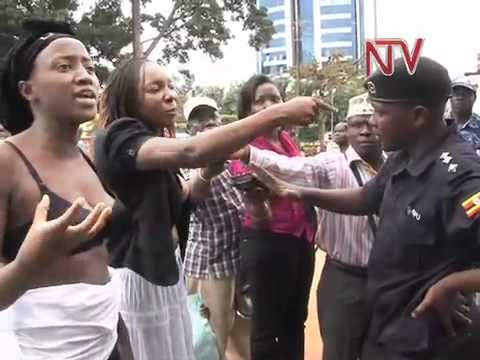 Activists strip to protest Assault on Turinawe - YouTube