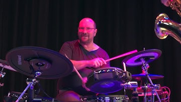 In a Silent Way: Communication Between AI and Improvising Musicians Beyond Sound