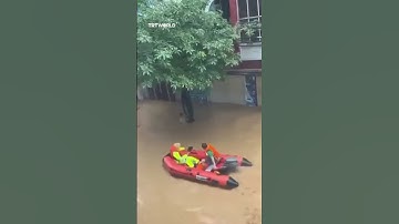 Dramatic rescue as man saved from record floodwaters in Vietnam