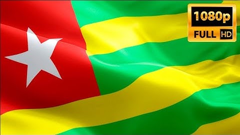 Togolese flag video waving in wind. Realistic Lome Flag background. Togo flag Full H