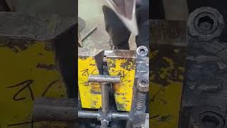 Making a circular knife stand by bending flat sharp iron first, then attaching it onto a pole firmly
