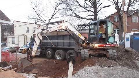 Bobcat Excavator Loading a Truck