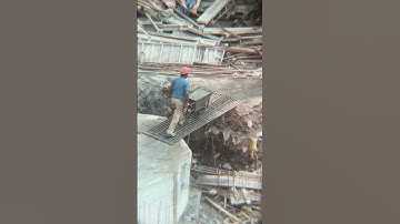 Worker using wheelbarrow to transport concrete #construction #work #workers #wheelbarrow #concrete