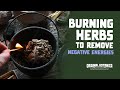 Burning herbs to remove negative energies