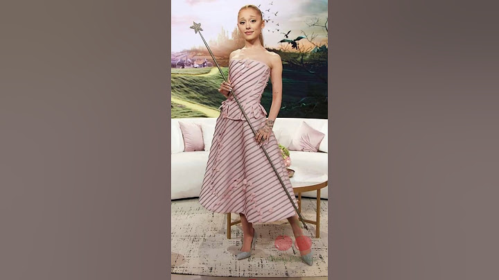 Ariana holds the Original Glinda Wand ✨