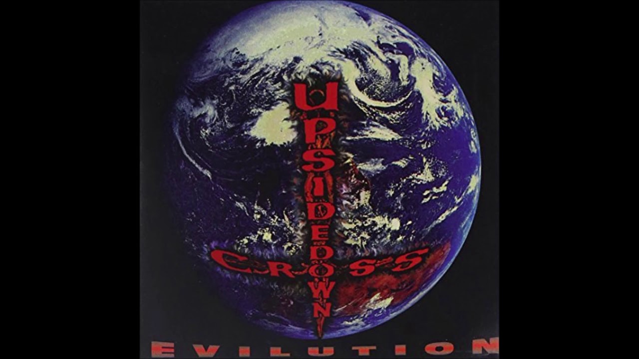 upsidedown cross, ''Village Idiot'', 1993