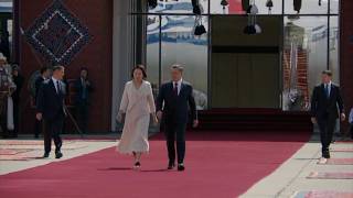 Kyrgyz president and his wife welcome Chinese President Xi Jinping at airport in Bishkek